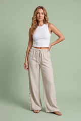 Weite beige Hose mit Muscheln