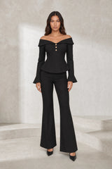 Ensemble pantalon noir à épaules dénudées