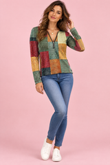 Grünes Oberteil mit Patchwork-Print und Reißverschluss