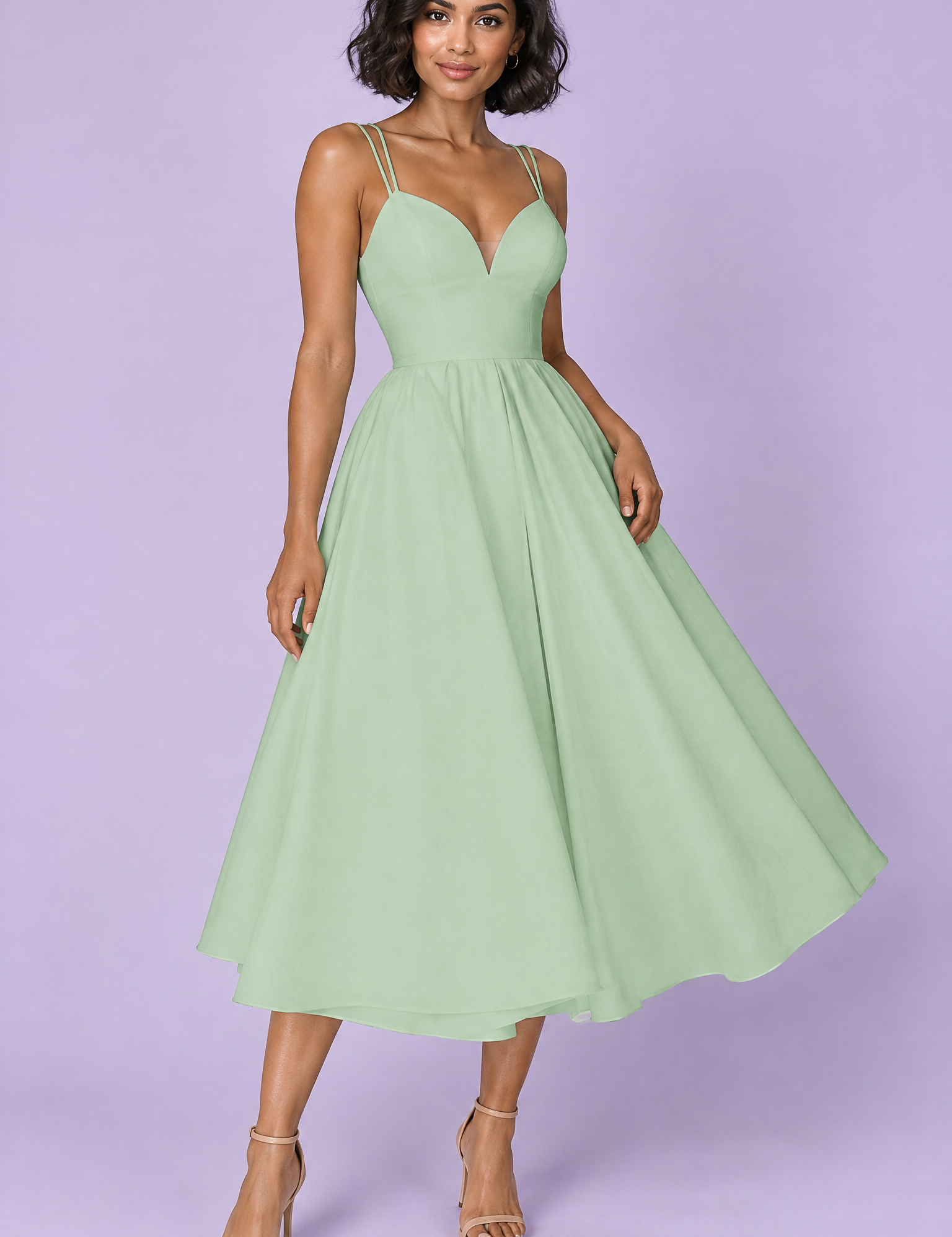 Robe midi verte à fines bretelles et jupe ample | Vue de face | Lounelle Paris