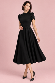Robe midi noire à col montant et manches bouffantes | Vue de dos | Lounelle Paris
