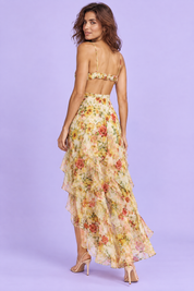 Robe longue jaune asymétrique à manches cape et imprimé lys | Vue de dos | Lounelle Paris