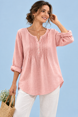 Rosa Baumwollbluse mit Rundhalsausschnitt und Knopfleiste mit Plisseefalten