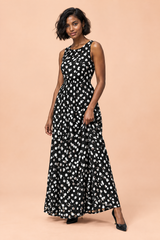Schwarzes Maxikleid mit Polka-Dots, hochgeschlossenem Ausschnitt und Drapierung