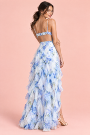 Robe longue bleue asymétrique à manches cape et imprimé lys | Vue de dos | Lounelle Paris